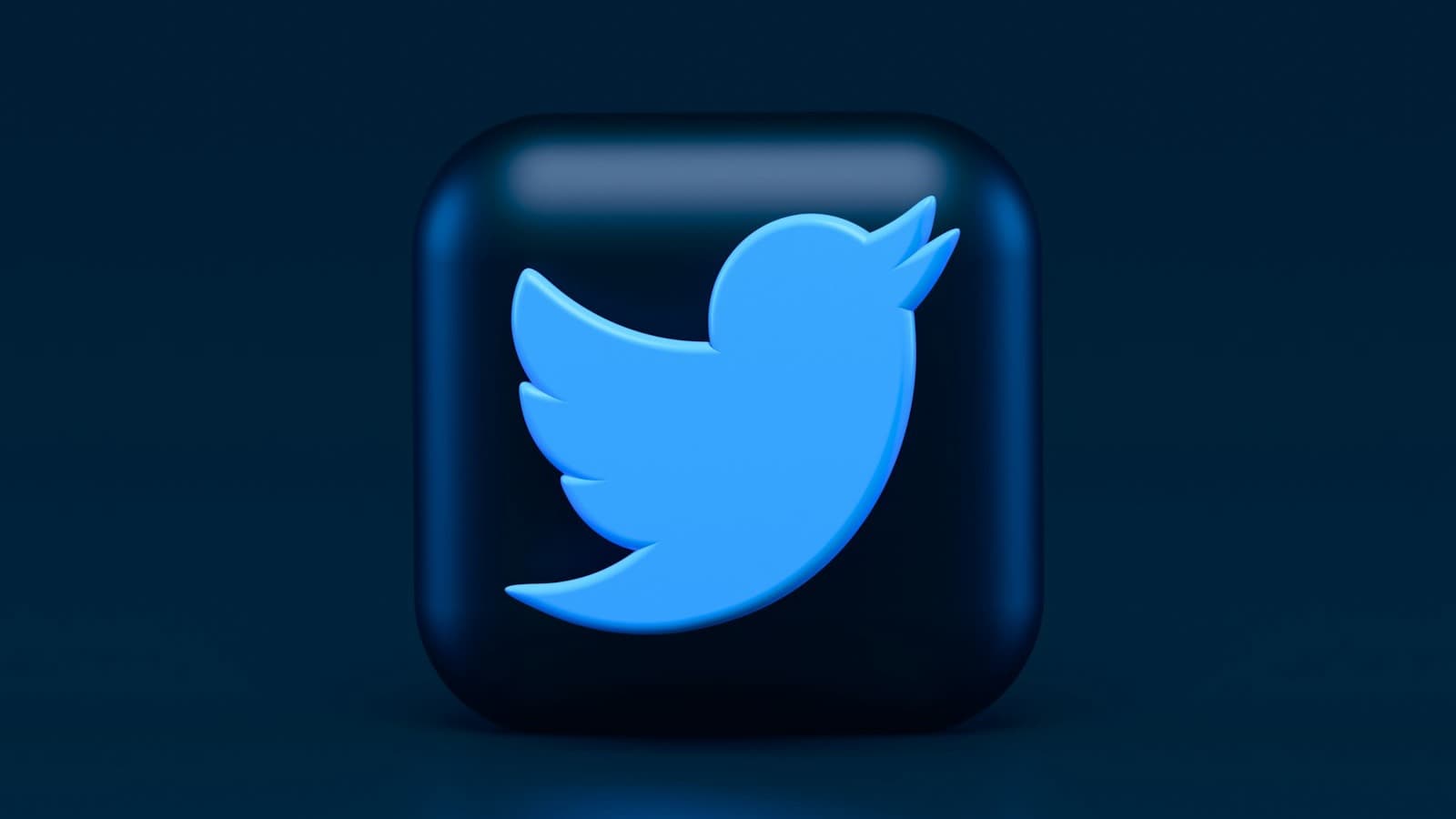3D rendered Twitter logo on a dark blue background